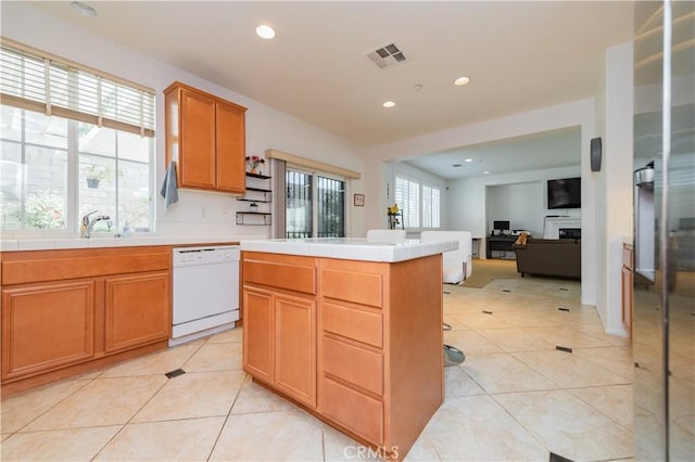 15752 Mimosa Ct, Fontana, CA 92336 - kitchen with white dishwasher, tile countertops, light tile patterned floors, recessed lighting, and a sink