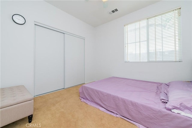 15752 Mimosa Ct, Fontana, CA 92336 - carpeted bedroom featuring a closet and ceiling fan