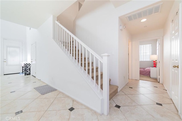 15752 Mimosa Ct, Fontana, CA 92336 - staircase with tile patterned floors