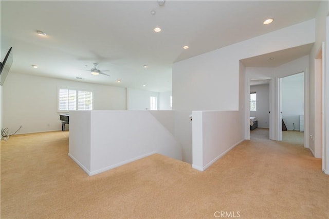 15752 Mimosa Ct, Fontana, CA 92336 - hallway featuring an upstairs landing, light carpet, healthy amount of natural light, recessed lighting, and baseboards
