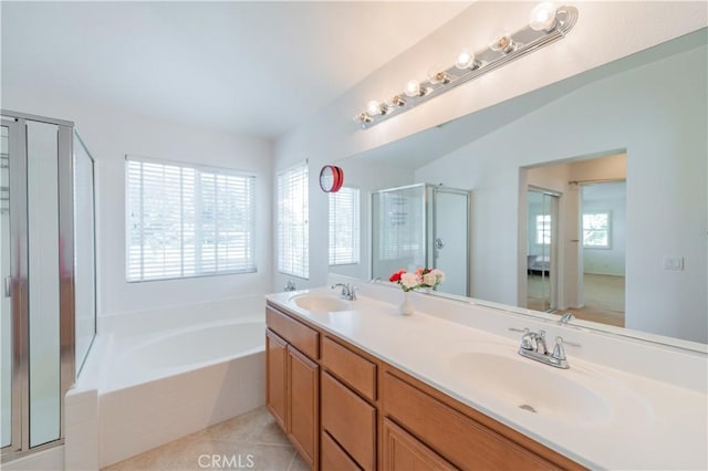 15752 Mimosa Ct, Fontana, CA 92336 - full bath with a stall shower, double vanity, a garden tub, and tile patterned floors