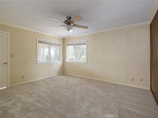 1715 W Santa Cruz St, San Pedro, CA 90732 - carpeted empty room featuring a ceiling fan, crown molding, a textured ceiling, and baseboards