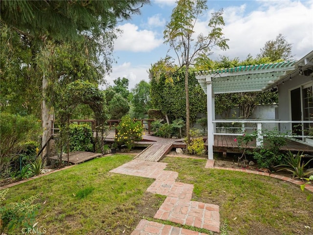 1715 W Santa Cruz St, San Pedro, CA 90732 - view of grassy yard featuring a wooden deck and a pergola
