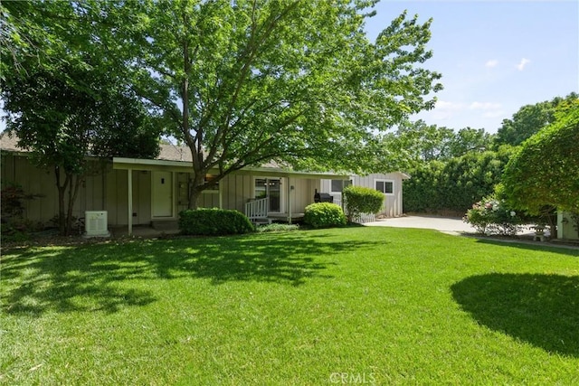 253 Gurnsey Dr, Red Bluff, CA 96080 - view of grassy yard with a porch