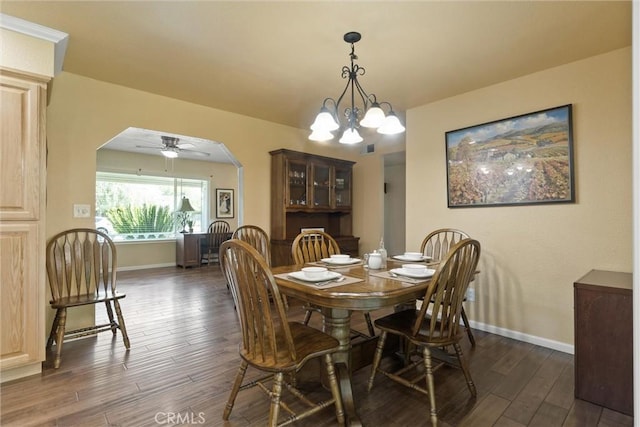 253 Gurnsey Dr, Red Bluff, CA 96080 - dining area featuring arched walkways, wood finished floors, baseboards, and ceiling fan