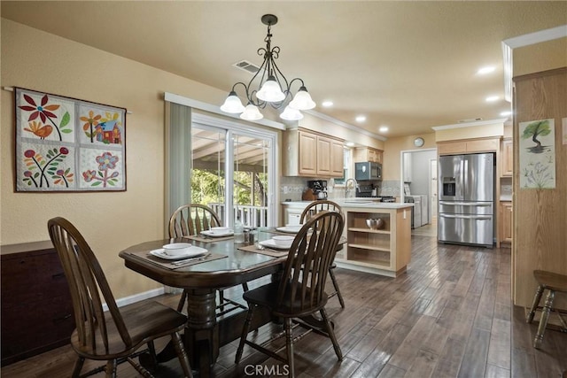 253 Gurnsey Dr, Red Bluff, CA 96080 - dining space with a chandelier, dark wood-style floors, baseboards, and recessed lighting