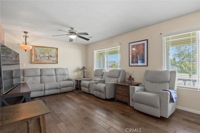 253 Gurnsey Dr, Red Bluff, CA 96080 - living room featuring wood finished floors, ceiling fan, and baseboards