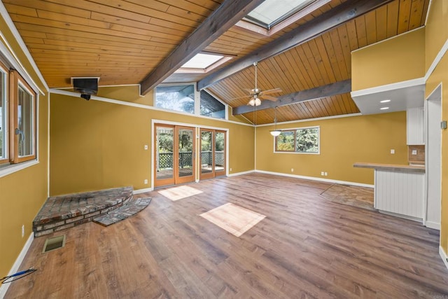 29131 Half Moon Trl, Pine Valley, CA 91962 - unfurnished living room with a skylight, baseboards, wood ceiling, wood finished floors, and a ceiling fan