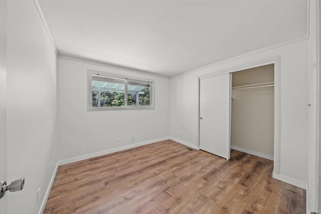 29131 Half Moon Trl, Pine Valley, CA 91962 - unfurnished bedroom with ornamental molding, light wood finished floors, a closet, and baseboards