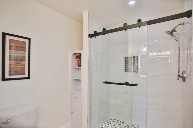 17041 Malta Cir, Huntington Beach, CA 92649 - bathroom with toilet, a shower stall, and baseboards