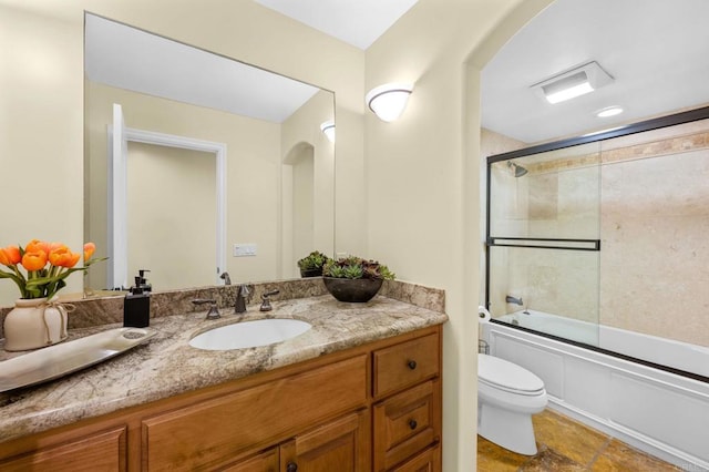 515 S Sierra Ave Unit 130, Solana Beach, CA 92075 - bathroom featuring vanity, toilet, and combined bath / shower with glass door