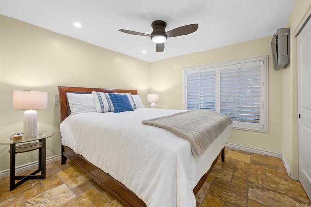 515 S Sierra Ave Unit 130, Solana Beach, CA 92075 - bedroom featuring stone tile flooring, baseboards, ceiling fan, and recessed lighting