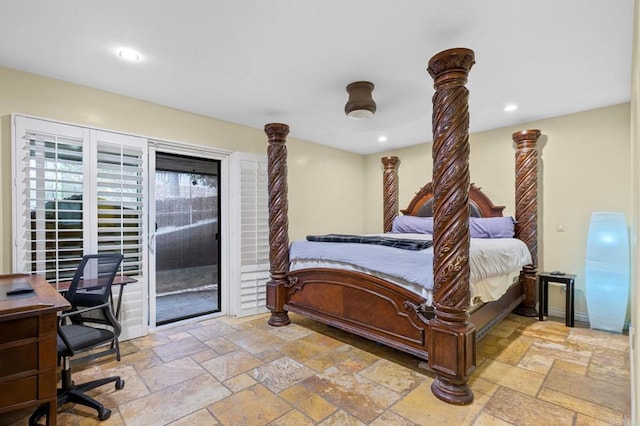 515 S Sierra Ave Unit 130, Solana Beach, CA 92075 - bedroom featuring stone tile floors, access to exterior, recessed lighting, a desk, and decorative columns