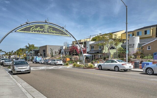 515 S Sierra Ave Unit 130, Solana Beach, CA 92075 - view of asphalt road with curbs, sidewalks, and street lights