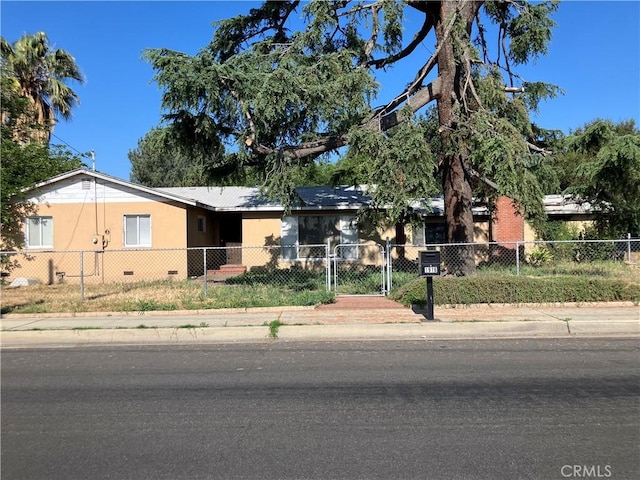 1916 S Oaks Ave, Ontario, CA 91762 - view of front of home featuring a gate and a fenced front yard