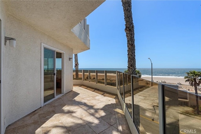 7335 Vista Del Mar Ln, Playa Del Rey, CA 90293 - view of patio / terrace featuring a balcony and view of water and beach