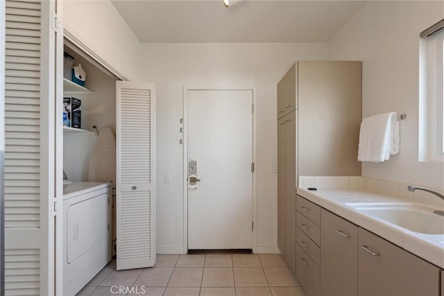7335 Vista Del Mar Ln, Playa Del Rey, CA 90293 - washroom featuring washer / clothes dryer and light tile patterned flooring