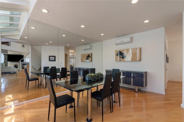 7335 Vista Del Mar Ln, Playa Del Rey, CA 90293 - dining area with a wall mounted air conditioner, light wood finished floors, recessed lighting, and baseboards