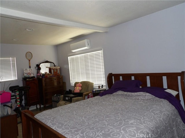 bedroom featuring a wall mounted air conditioner and beam ceiling