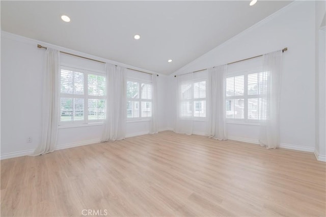 61 Greenfield Unit 68, Irvine, CA 92614 - unfurnished room with vaulted ceiling, light wood-style floors, baseboards, and recessed lighting