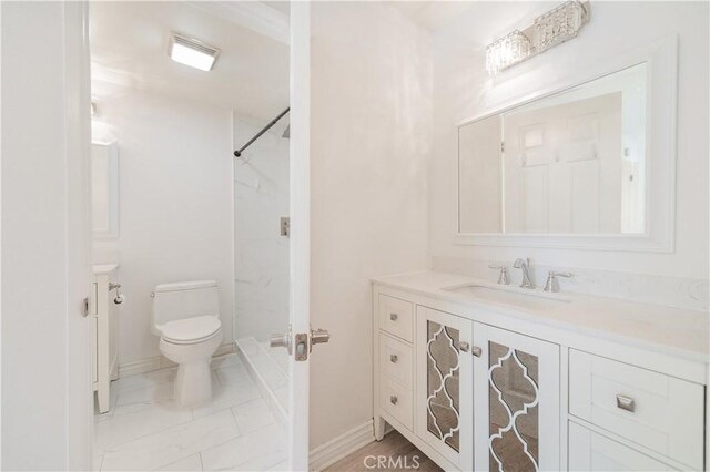 61 Greenfield Unit 68, Irvine, CA 92614 - full bath with vanity, toilet, a shower, marble finish flooring, and baseboards