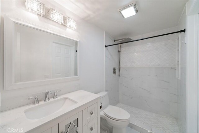 61 Greenfield Unit 68, Irvine, CA 92614 - full bathroom with toilet, vanity, and a marble finish shower