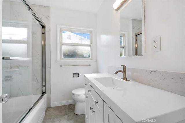 1510 E Idahome St, West Covina, CA 91791 - full bathroom with toilet, vanity, combined bath / shower with glass door, baseboards, and tile patterned floors