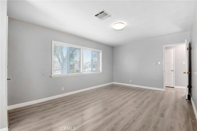 1510 E Idahome St, West Covina, CA 91791 - unfurnished room featuring light wood finished floors and baseboards