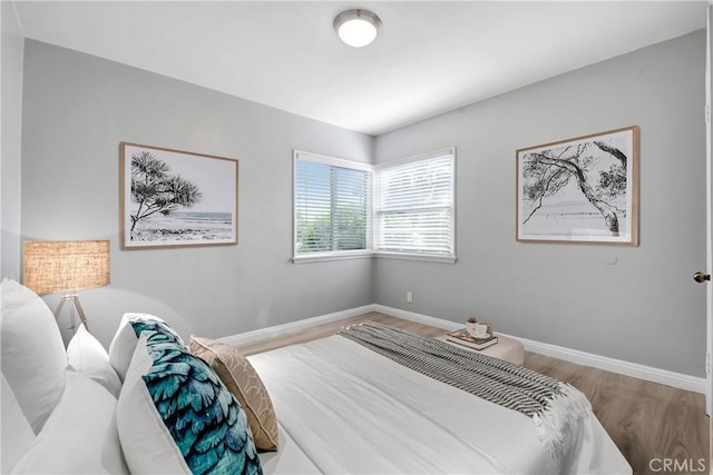 1510 E Idahome St, West Covina, CA 91791 - bedroom with baseboards and wood finished floors