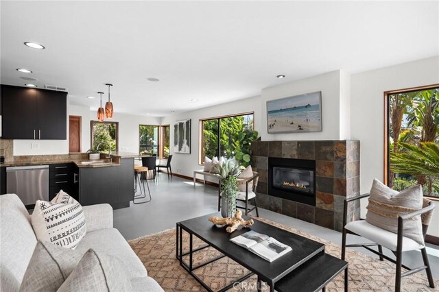 31532 Valido Rd, Laguna Beach, CA 92651 - living area with concrete floors, recessed lighting, and a tile fireplace