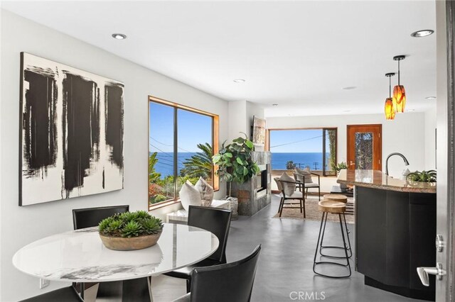 31532 Valido Rd, Laguna Beach, CA 92651 - dining room featuring finished concrete flooring and recessed lighting