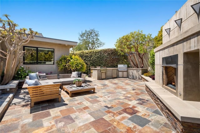 31532 Valido Rd, Laguna Beach, CA 92651 - view of patio / terrace featuring an outdoor kitchen and an outdoor living space with a fireplace