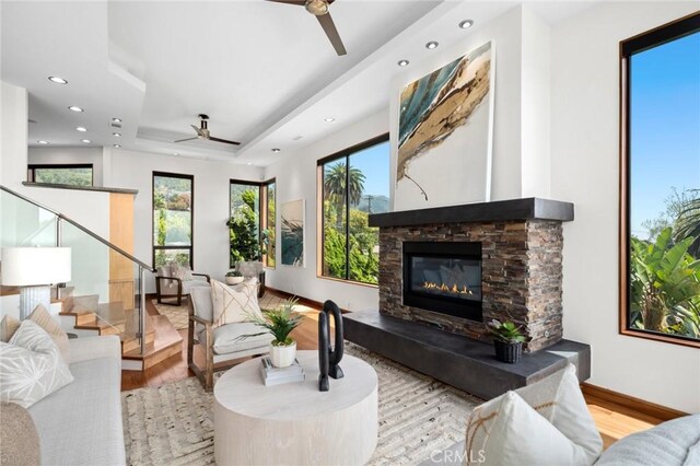 31532 Valido Rd, Laguna Beach, CA 92651 - living area with a ceiling fan, wood finished floors, a stone fireplace, stairway, and recessed lighting