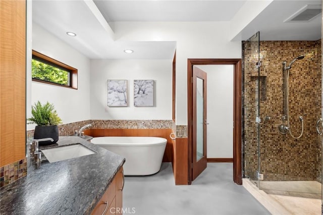 31532 Valido Rd, Laguna Beach, CA 92651 - bathroom with vanity, a soaking tub, a stall shower, and recessed lighting