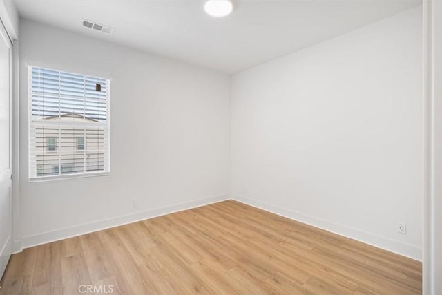 1901 Aliso Canyon Dr, Lake Forest, CA 92610 - unfurnished room with light wood-style flooring and baseboards