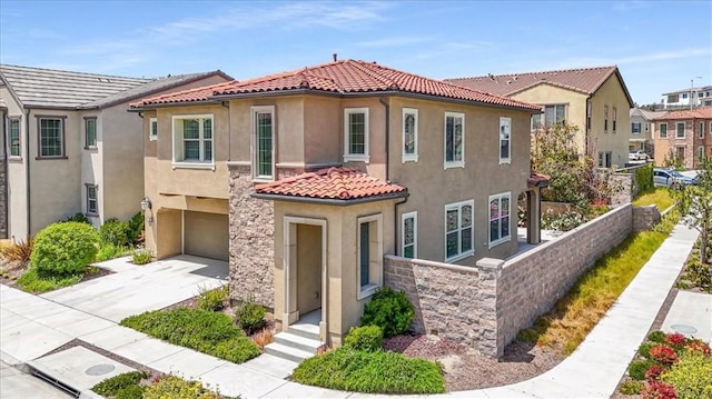 1901 Aliso Canyon Dr, Lake Forest, CA 92610 - view of front of house with an attached garage, a tile roof, stucco siding, and concrete driveway