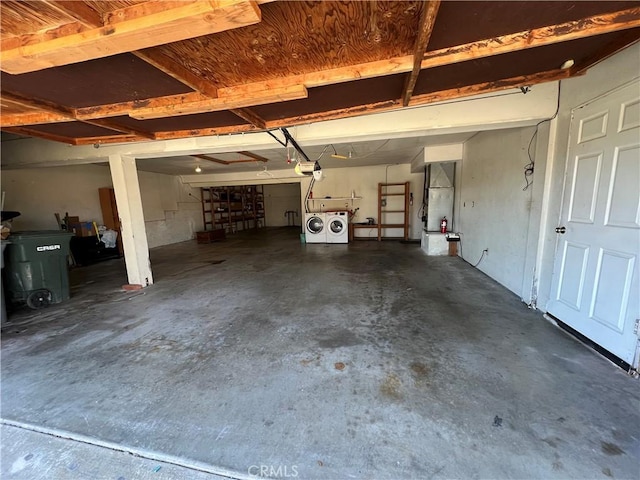 23029 Gray Fox Dr, Canyon Lake, CA 92587 - garage featuring washer and clothes dryer and a garage door opener