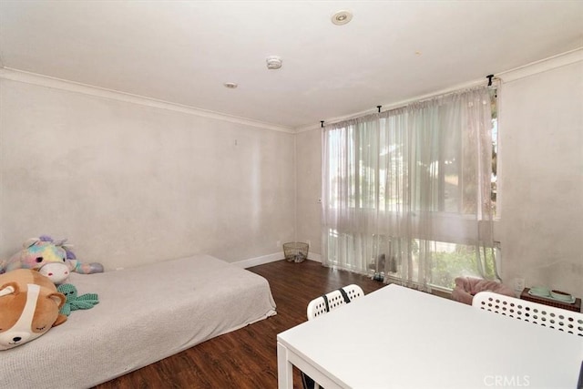 12113 Beverly Blvd Unit A, Whittier, CA 90601 - bedroom featuring multiple windows, wood finished floors, baseboards, and crown molding