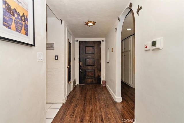12113 Beverly Blvd Unit A, Whittier, CA 90601 - hall featuring wood finished floors and baseboards
