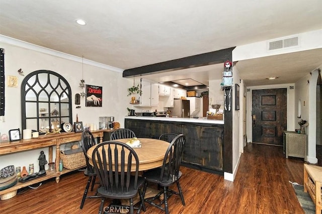 12113 Beverly Blvd Unit A, Whittier, CA 90601 - dining space featuring dark wood-style flooring, crown molding, and recessed lighting
