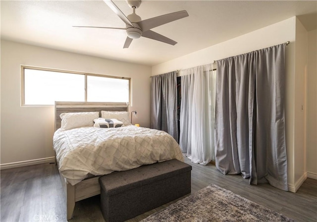 19264 Casmalia St, Rialto, CA 92377 - bedroom featuring dark wood-type flooring, baseboards, and a ceiling fan