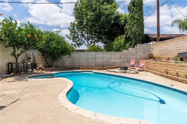 19264 Casmalia St, Rialto, CA 92377 - view of swimming pool featuring a fenced backyard and a patio area