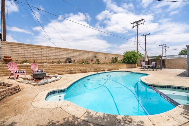19264 Casmalia St, Rialto, CA 92377 - view of swimming pool featuring a fenced backyard, a patio area, and a pool with connected hot tub