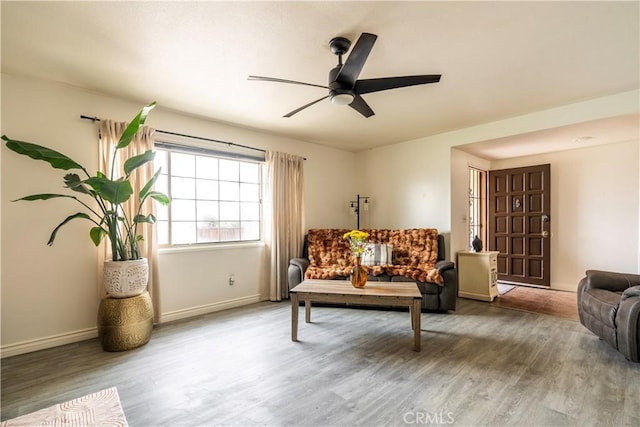 19264 Casmalia St, Rialto, CA 92377 - living area featuring wood finished floors, ceiling fan, and baseboards