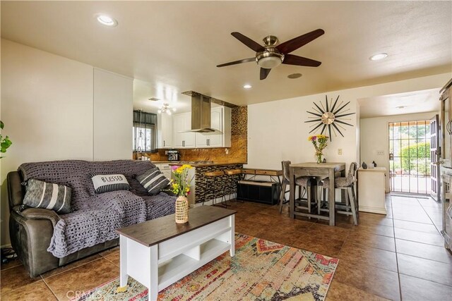 19264 Casmalia St, Rialto, CA 92377 - tiled living room with ceiling fan and recessed lighting