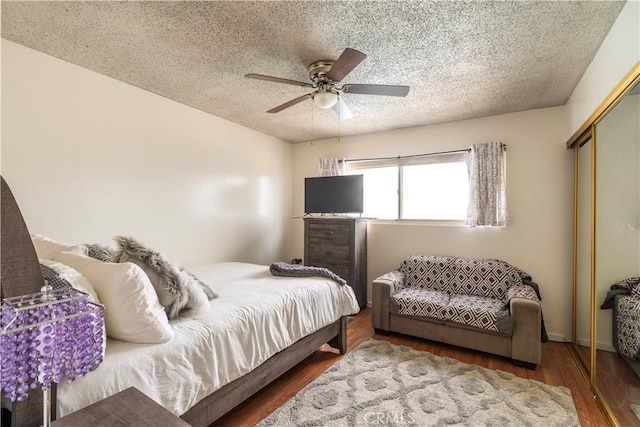 19264 Casmalia St, Rialto, CA 92377 - bedroom featuring a closet, a textured ceiling, wood finished floors, and ceiling fan