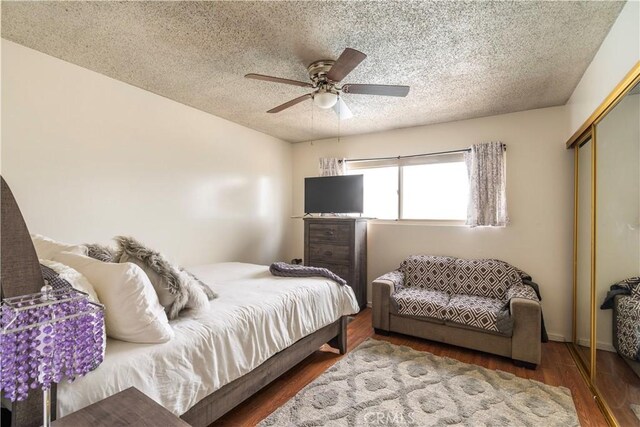 19264 Casmalia St, Rialto, CA 92377 - bedroom featuring a closet, a textured ceiling, wood finished floors, and ceiling fan