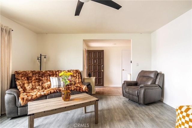 19264 Casmalia St, Rialto, CA 92377 - living room with wood finished floors, ceiling fan, and baseboards