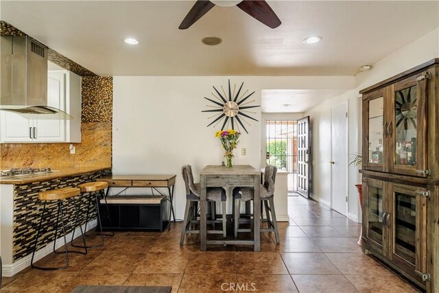 19264 Casmalia St, Rialto, CA 92377 - dining space with a ceiling fan, tile patterned flooring, recessed lighting, and baseboards