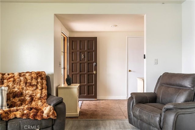 19264 Casmalia St, Rialto, CA 92377 - sitting room with wood finished floors and baseboards